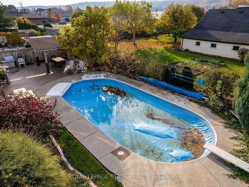 48 Tuscani Dr, Hamilton, ON - Outdoor With In Ground Pool