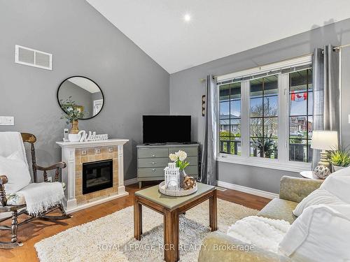 62 Springdale Dr, Kawartha Lakes, ON - Indoor Photo Showing Living Room With Fireplace