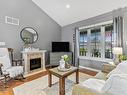 62 Springdale Dr, Kawartha Lakes, ON  - Indoor Photo Showing Living Room With Fireplace 