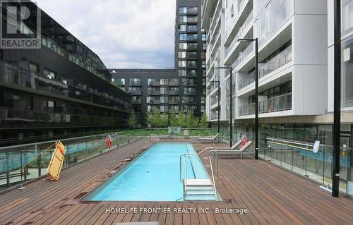 514 - 32 Trolley Crescent W, Toronto, ON - Outdoor With In Ground Pool