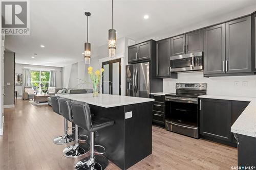 1127 7Th Street E, Saskatoon, SK - Indoor Photo Showing Kitchen With Stainless Steel Kitchen With Upgraded Kitchen