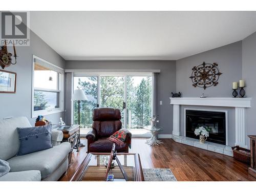 4450 Ponderosa Drive Unit# 201, Peachland, BC - Indoor Photo Showing Living Room With Fireplace