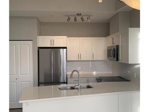 404-844 Goldstream Ave, Langford, BC - Indoor Photo Showing Kitchen With Double Sink