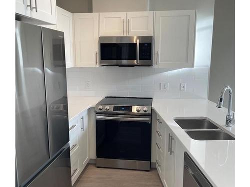 404-844 Goldstream Ave, Langford, BC - Indoor Photo Showing Kitchen With Double Sink