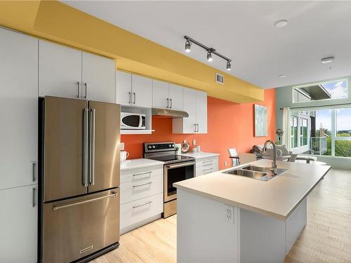 404-2319 Brethour Ave, Sidney, BC - Indoor Photo Showing Kitchen With Double Sink