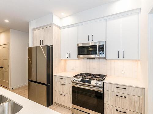 504-958 Pharoah Mews, Langford, BC - Indoor Photo Showing Kitchen With Double Sink With Upgraded Kitchen