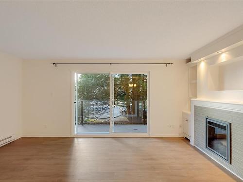 208-1024 Fairfield Rd, Victoria, BC - Indoor With Fireplace