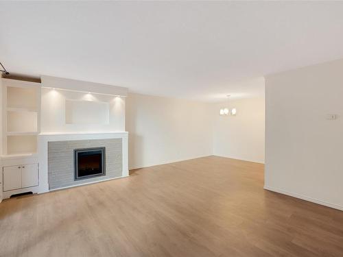 208-1024 Fairfield Rd, Victoria, BC - Indoor Photo Showing Other Room With Fireplace