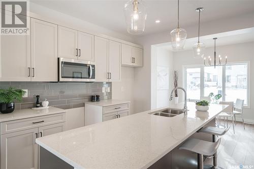 5140 Buckingham Drive E, Regina, SK - Indoor Photo Showing Kitchen With Double Sink With Upgraded Kitchen