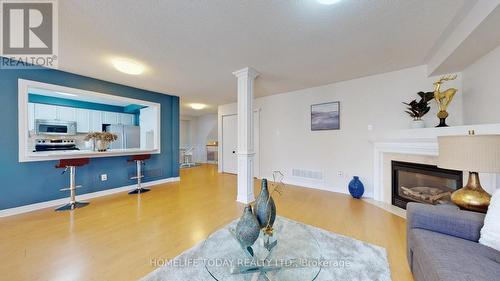 7 Colbeck Crescent, Brampton, ON - Indoor Photo Showing Living Room With Fireplace