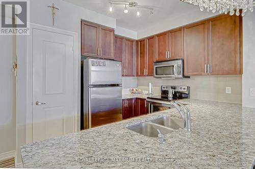 706 - 9245 Jane Street, Vaughan, ON - Indoor Photo Showing Kitchen With Stainless Steel Kitchen With Double Sink With Upgraded Kitchen