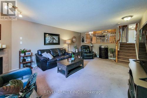 2 Hampshire Place, Hamilton, ON - Indoor Photo Showing Living Room With Fireplace