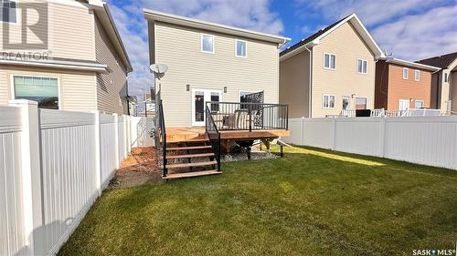 8869 Herman Crescent, Regina, SK - Outdoor With Deck Patio Veranda With Exterior