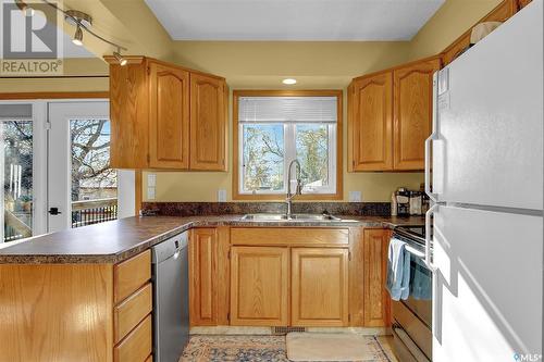 82 Mcsherry Crescent, Regina, SK - Indoor Photo Showing Kitchen With Double Sink