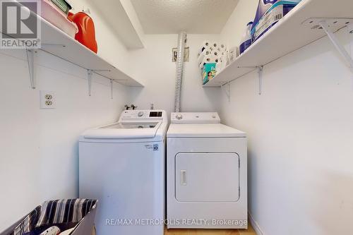 106 - 4060 Lawrence Avenue E, Toronto, ON - Indoor Photo Showing Laundry Room