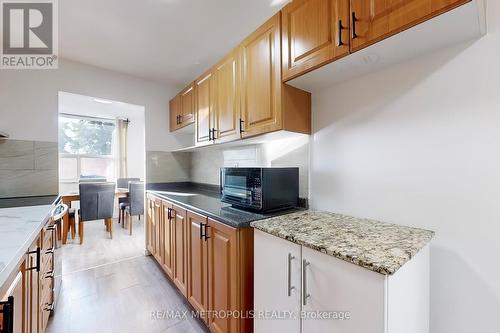 106 - 4060 Lawrence Avenue E, Toronto, ON - Indoor Photo Showing Kitchen