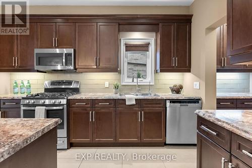 5803 Fiddlehead Lane, Niagara Falls, ON - Indoor Photo Showing Kitchen With Double Sink With Upgraded Kitchen