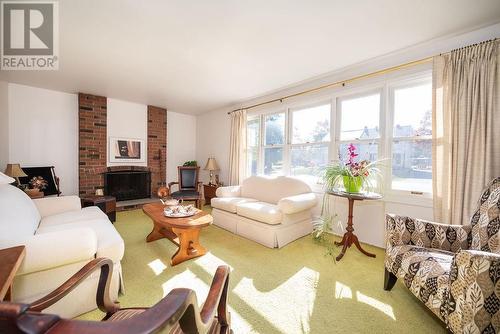 26 Rutherford Avenue, Deep River, ON - Indoor Photo Showing Living Room With Fireplace