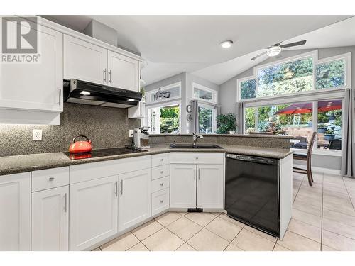 3945 Gallaghers Circle, Kelowna, BC - Indoor Photo Showing Kitchen With Double Sink