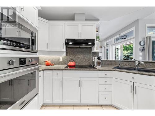 3945 Gallaghers Circle, Kelowna, BC - Indoor Photo Showing Kitchen With Double Sink