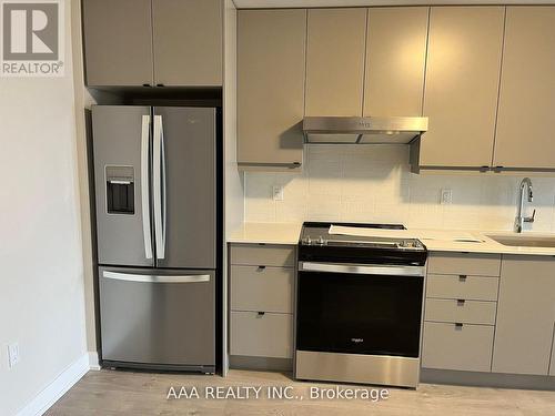 1009 - 3200 William Coltson Avenue, Oakville, ON - Indoor Photo Showing Kitchen