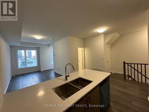 Th 354 - 100 Honeycrisp Crescent, Vaughan, ON - Indoor Photo Showing Kitchen With Double Sink