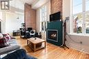 206 - 589 Rideau Street, Ottawa, ON  - Indoor Photo Showing Living Room With Fireplace 