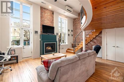 589 Rideau Street Unit#206, Ottawa, ON - Indoor Photo Showing Living Room With Fireplace