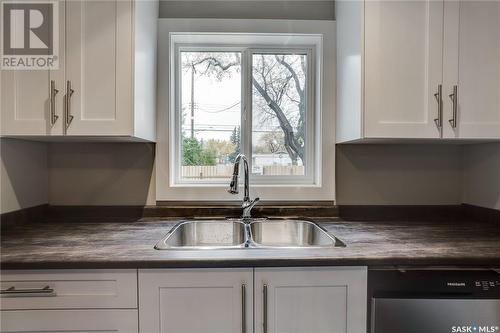 1336 B Avenue N, Saskatoon, SK - Indoor Photo Showing Kitchen With Double Sink