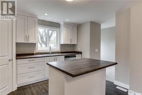 1336 B Avenue N, Saskatoon, SK - Indoor Photo Showing Kitchen With Double Sink