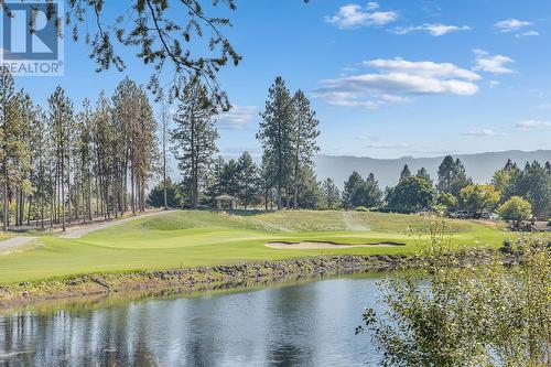 Positioned along the 18th hole of the Championship Quail Course at the Okanagan Golf Club. - 1979 Country Club Drive Unit# 7, Kelowna, BC - Outdoor With Body Of Water With View