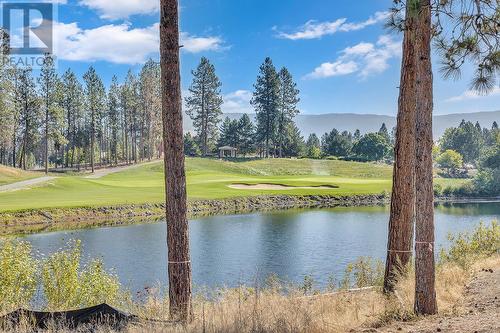 Manicured nature, golf and waterfront views. - 1979 Country Club Drive Unit# 7, Kelowna, BC - Outdoor With Body Of Water With View