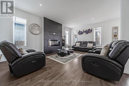 3319 Regiment Road, London, ON - Indoor Photo Showing Living Room With Fireplace