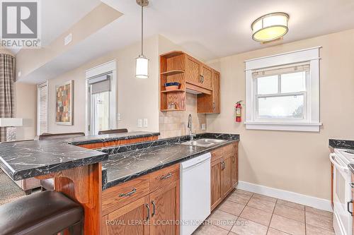 226 - 125 Fairway Court, Blue Mountains, ON - Indoor Photo Showing Kitchen With Double Sink