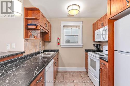 226 - 125 Fairway Court, Blue Mountains, ON - Indoor Photo Showing Kitchen With Double Sink