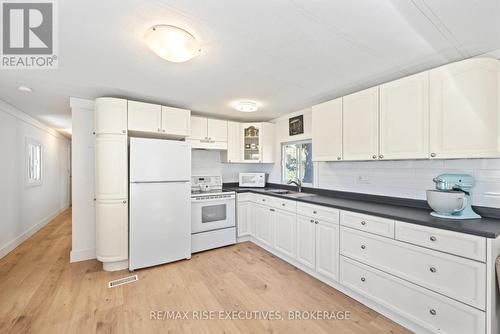 22 - 5569 Bath Road, Loyalist (Lennox And Addington - South), ON - Indoor Photo Showing Kitchen