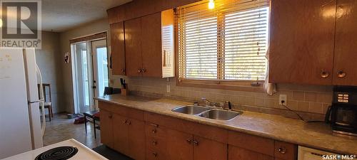 311 5Th Avenue, Loon Lake, SK - Indoor Photo Showing Kitchen With Double Sink