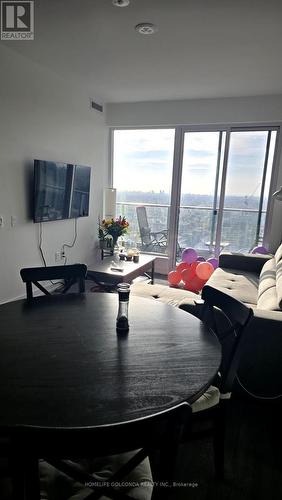 3304 - 8 Olympic Garden Drive S, Toronto, ON - Indoor Photo Showing Living Room