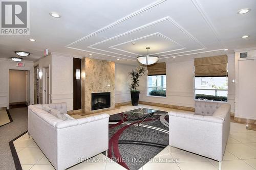 209 - 30 North Park Road, Vaughan, ON - Indoor Photo Showing Living Room With Fireplace