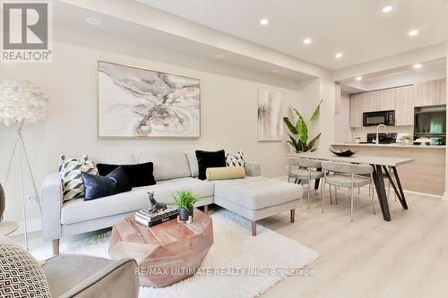 Th06 - 330 Village Green Square, Toronto, ON - Indoor Photo Showing Living Room