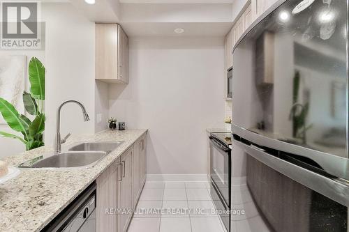 Th06 - 330 Village Green Square, Toronto, ON - Indoor Photo Showing Kitchen With Double Sink With Upgraded Kitchen