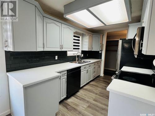 404 1St Street W, Kyle, SK - Indoor Photo Showing Kitchen With Double Sink