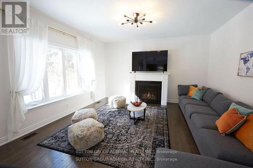 4 Boville Court E, Oro-Medonte, ON - Indoor Photo Showing Living Room With Fireplace