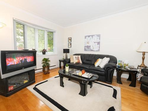 Salon - 10382  - 10384 Av. Des Laurentides, Montréal (Montréal-Nord), QC - Indoor Photo Showing Living Room With Fireplace