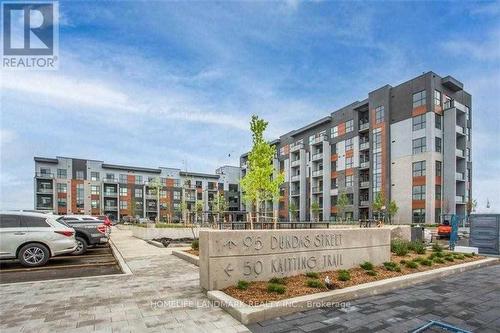 417 - 95 Dundas Street W, Oakville, ON - Outdoor With Facade