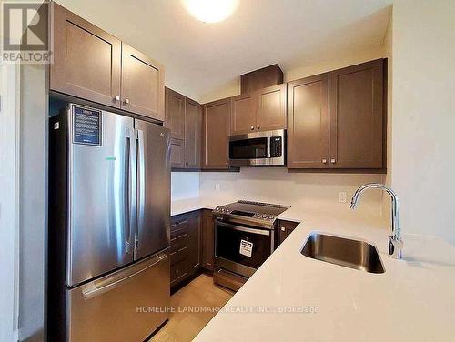 417 - 95 Dundas Street W, Oakville, ON - Indoor Photo Showing Kitchen With Stainless Steel Kitchen