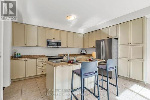 286 Etheridge Avenue, Milton, ON - Indoor Photo Showing Kitchen With Double Sink