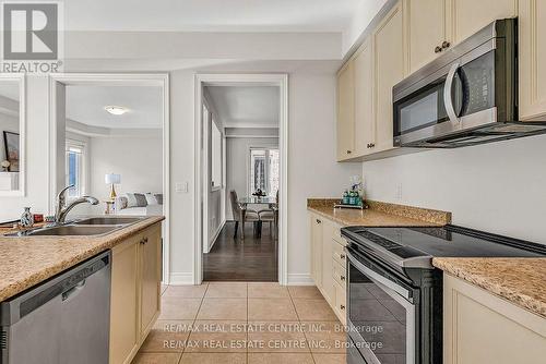 286 Etheridge Avenue, Milton, ON - Indoor Photo Showing Kitchen With Double Sink