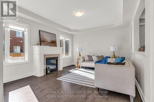 286 Etheridge Avenue, Milton, ON - Indoor Photo Showing Living Room With Fireplace