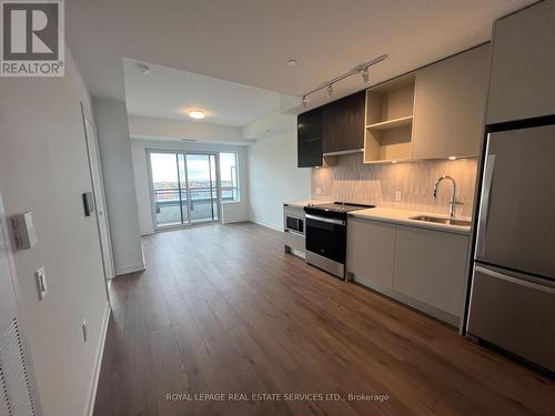 609 - 395 Dundas Street W, Oakville, ON - Indoor Photo Showing Kitchen With Stainless Steel Kitchen